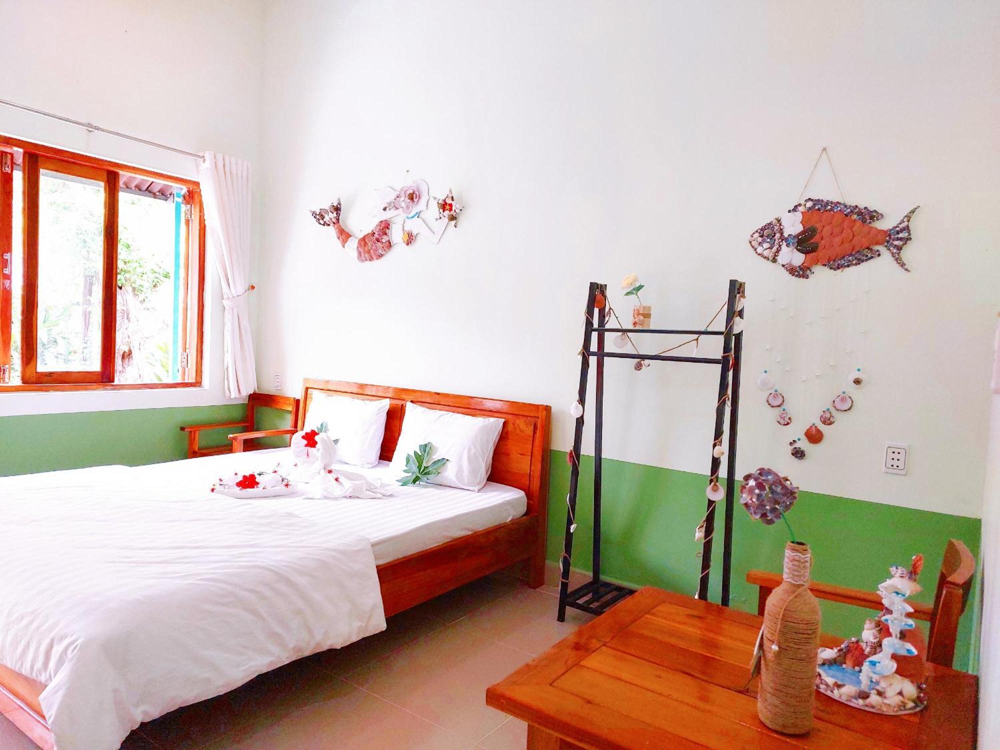 Ben Guesthouse Duong Dong Quarto foto
