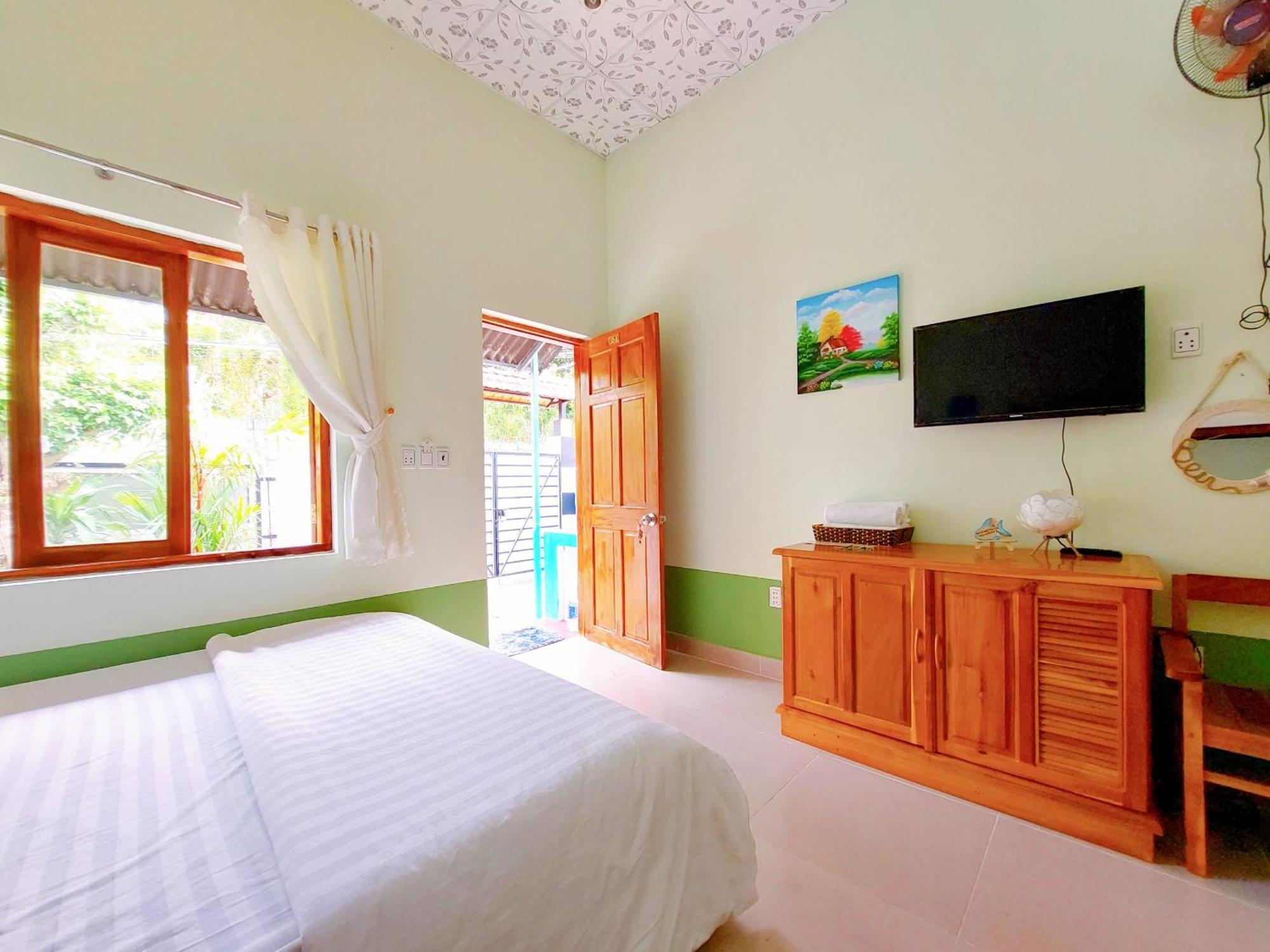 Ben Guesthouse Duong Dong Quarto foto