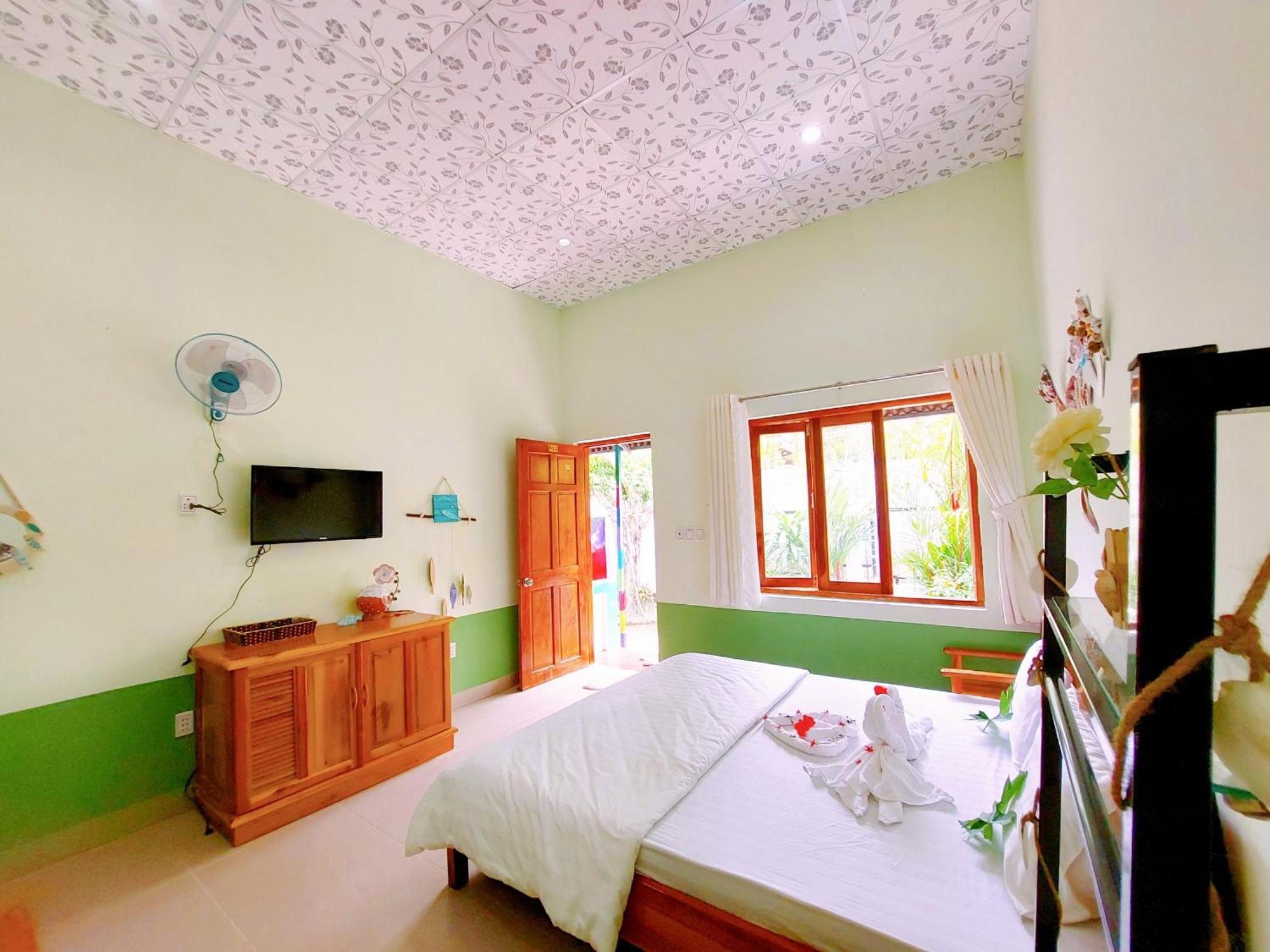 Ben Guesthouse Duong Dong Quarto foto