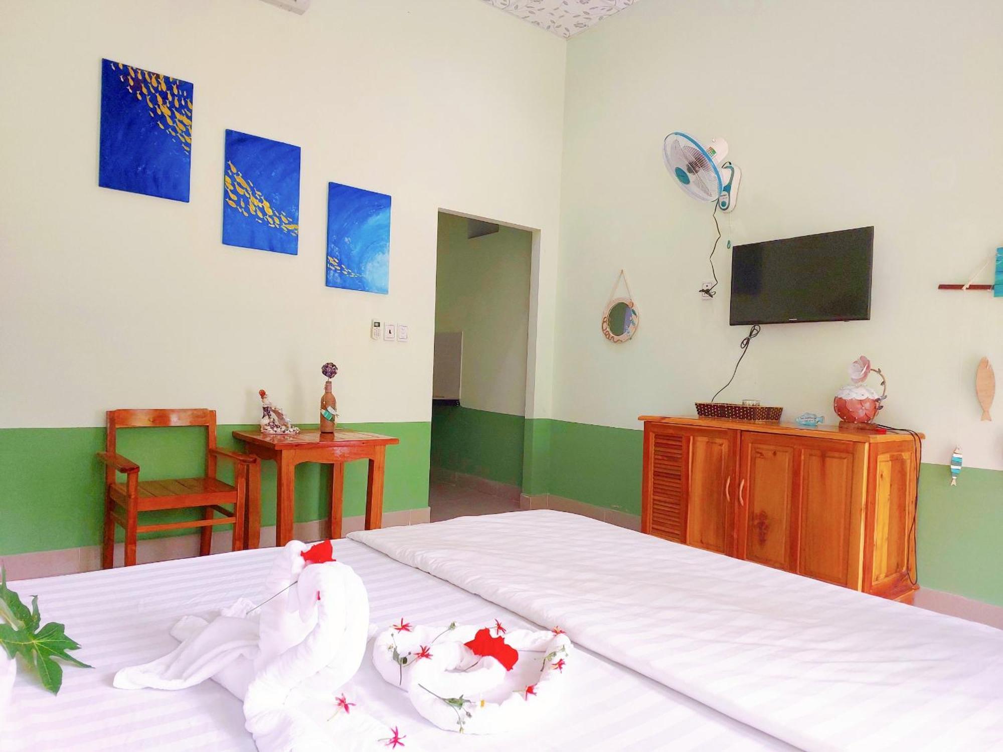 Ben Guesthouse Duong Dong Quarto foto